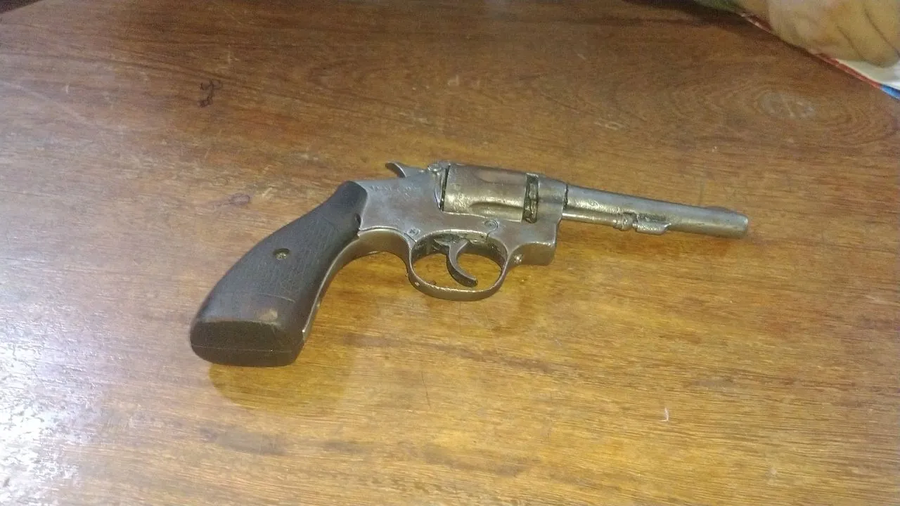 Arma utilizada no crime.